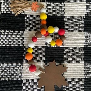 Painted wooden beads accent Rea Dunn Fall displays